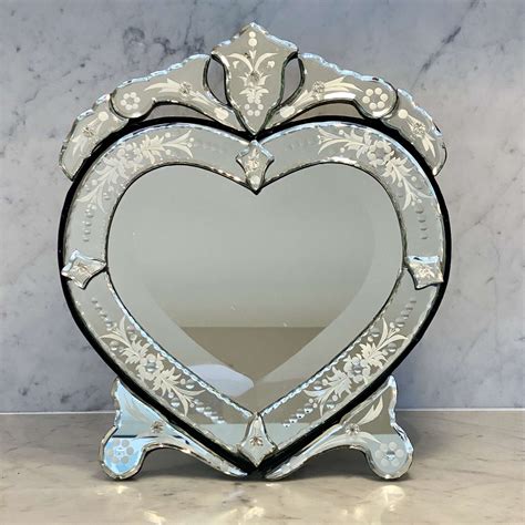 antique heart shaped mirror